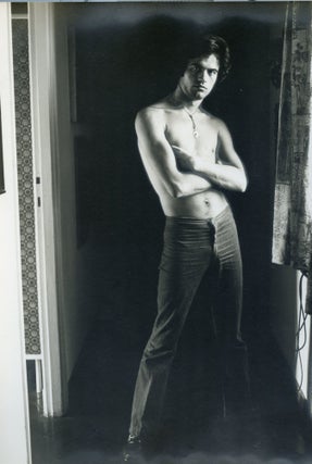 Portraits of shirtless male in jeans